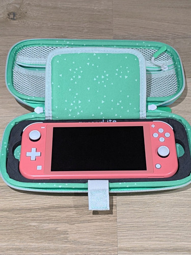 Nintendo switch lite coral - nintendo,